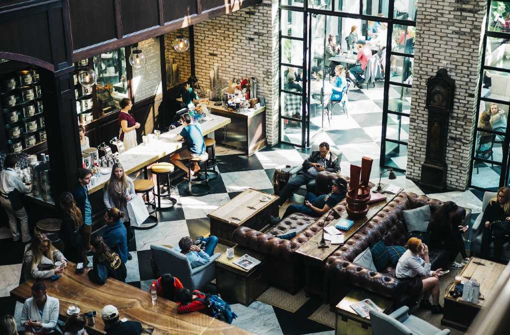 The Etiquette of Table Sharing in a Crowded Coffee Shop
